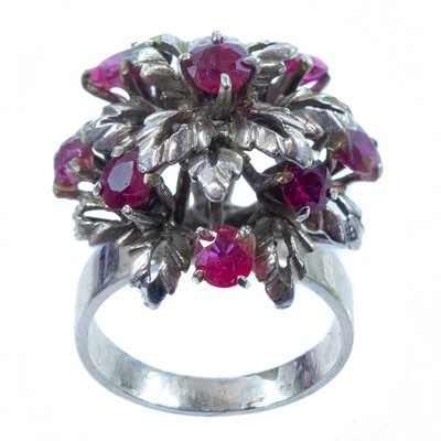 Lot 86 - A 9ct (tested) white gold ruby set dress ring.