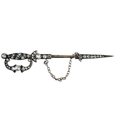 Lot 216 - A Victorian gold, white metal and diamond and pearl set jabot pin in the form of a sword.