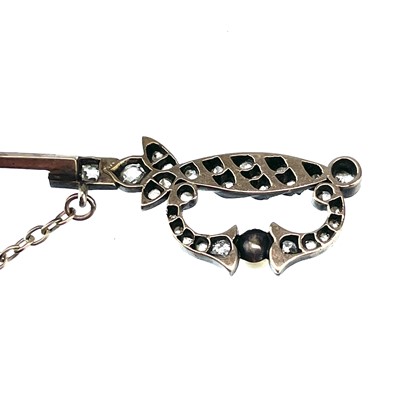 Lot 216 - A Victorian gold, white metal and diamond and pearl set jabot pin in the form of a sword.