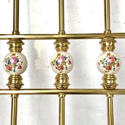 Lot 1819 - A Victorian style brass bed head and end.