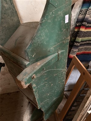 Lot 422 - A wooden wheelbarrow.