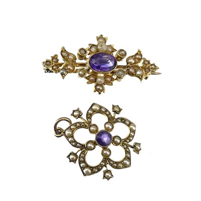Lot 186 - A Victorian 15ct gold amethyst and seed pearl set brooch.