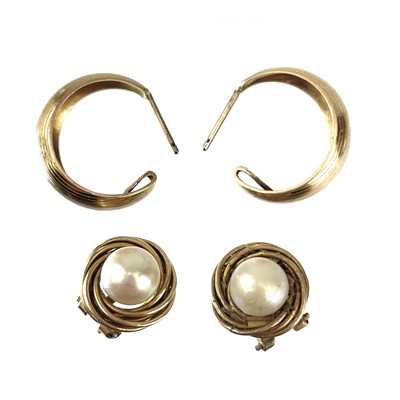 Lot 133 - A pair of 14ct cultured pearl set clip earrings.