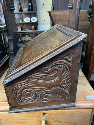 Lot 1 - A carved oak bible box, 17th century.