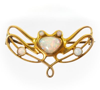 Lot 156 - An early 20th century gold five stone opal set Art Nouveau brooch.