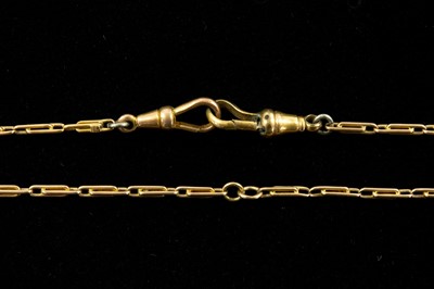 Lot 79 - A rose gold (tests high purity) retangular fancy link longuard chain.