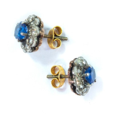 Lot 127 - A pair early 20th century rose gold diamond and sapphire cluster stud earrings.