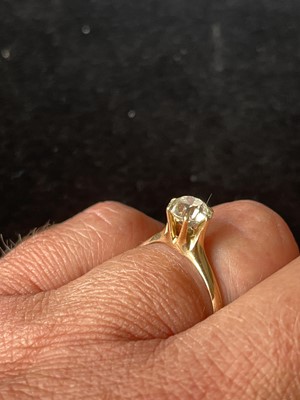 Lot 119 - A 14ct gold diamond solitaire ring.