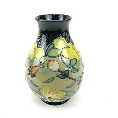 Lot 865 - A Moorcroft Hypericum vase, height 19cm, in box.