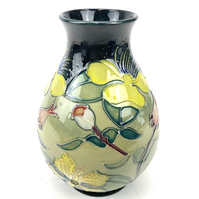 Lot 865 - A Moorcroft Hypericum vase, height 19cm, in box.