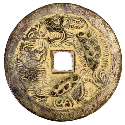 Lot 420 - A Chinese marriage token with embossed dragon.