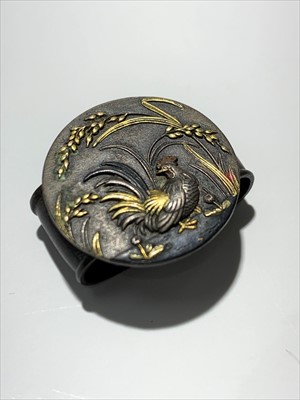Lot 2422 - A Japanese shakudo copper alloy scarf slide...