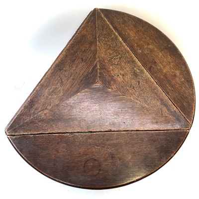 Lot 54 - An oak drop leaf occasional table, early 20th century, of triangular form.
