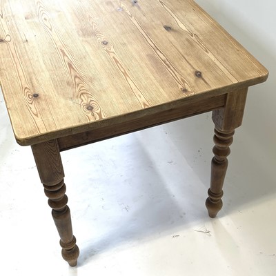 Lot 52 - A Victorian pine kitchen table.