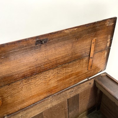 Lot 15 - A carved oak coffer, 17th century.
