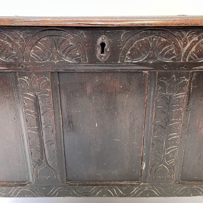 Lot 15 - A carved oak coffer, 17th century.
