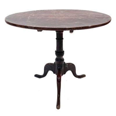 Lot 9 - A George III oak tripod table.