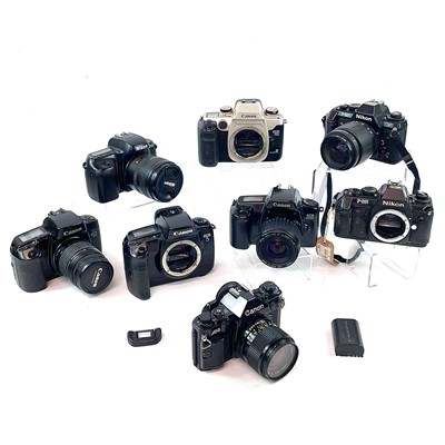 Lot 148 - A Canon EOS 1000F SLR camera serial number...