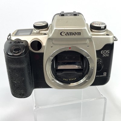 Lot 148 - A Canon EOS 1000F SLR camera serial number...