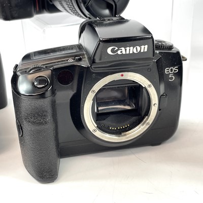 Lot 148 - A Canon EOS 1000F SLR camera serial number...