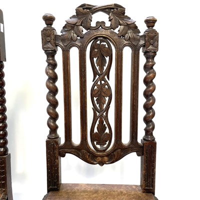 Lot 20 - A carved oak side chair, late 18th/early 19th century.