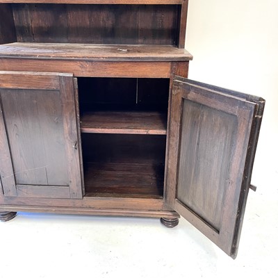 Lot 23 - A continental walnut kitchen dresser, 19th century.
