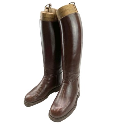 Lot 59 - A pair of brown leather riding boots and trees,...