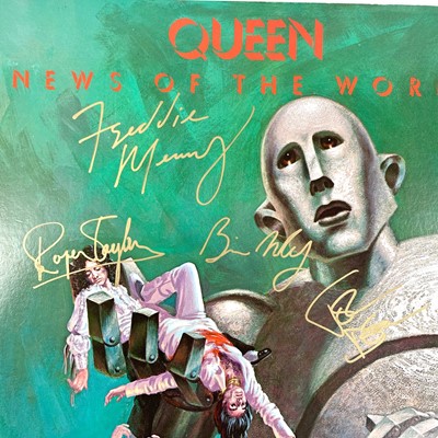 Lot 4 - SIGNED QUEEN 12". 'News of the World.