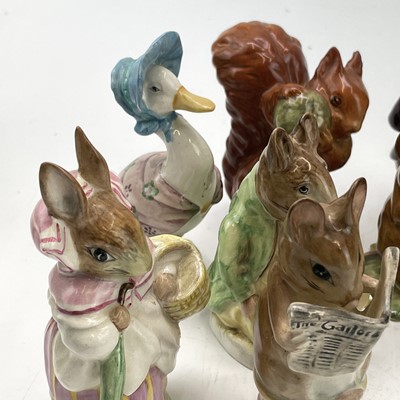 Lot 916 - A Beswick Beatrix potter figure of Peter...