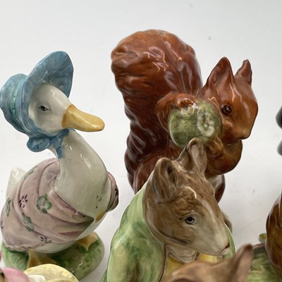 Lot 916 - A Beswick Beatrix potter figure of Peter...