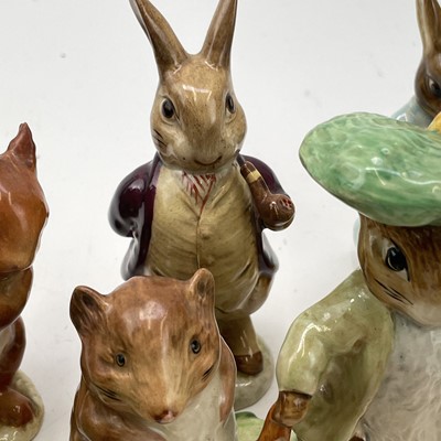Lot 916 - A Beswick Beatrix potter figure of Peter...