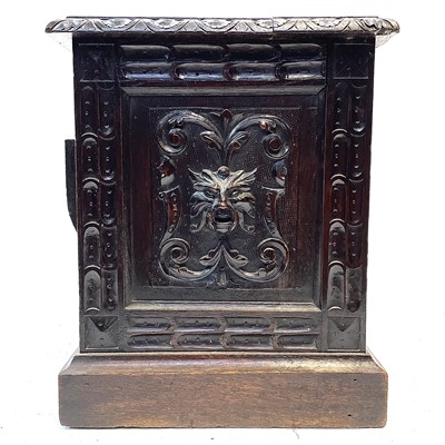 Lot 36 - A Victorian carved oak coal box.