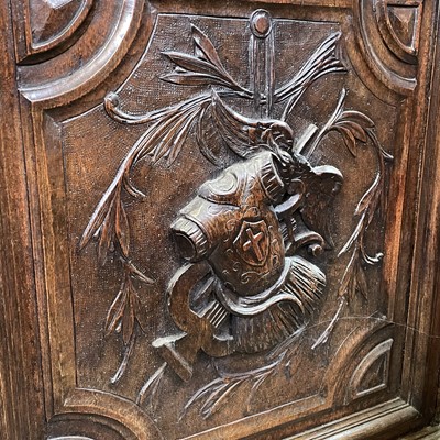Lot 37 - A Victorian carved oak side cabinet.