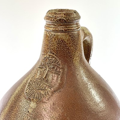Lot 46 - A German salt glaze stoneware bellarmine, 17th century.