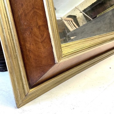 Lot 47 - An 18th century style walnut and gilt framed wall mirror.