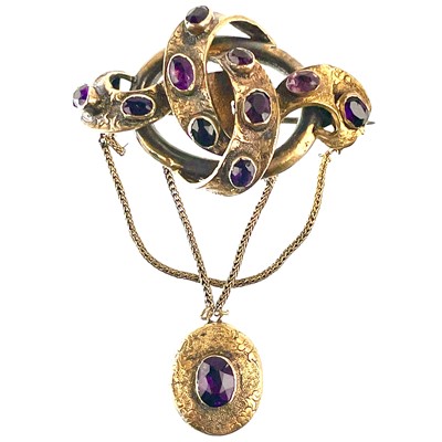 Lot 5 - A Victorian gold and amethyst set brooch
