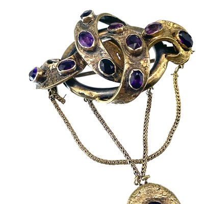 Lot 5 - A Victorian gold and amethyst set brooch