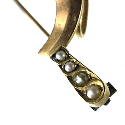 Lot 72 - A Victorian rose gold pearl set scythe brooch
