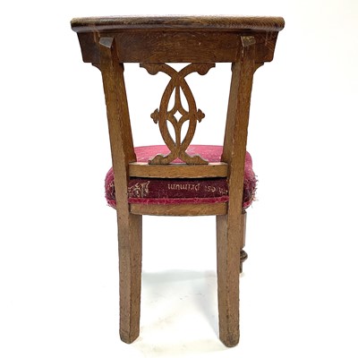 Lot 48 - A set of six Victorian oak dining chairs.