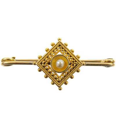 Lot 212 - A Victorian gold pearl set pin brooch.