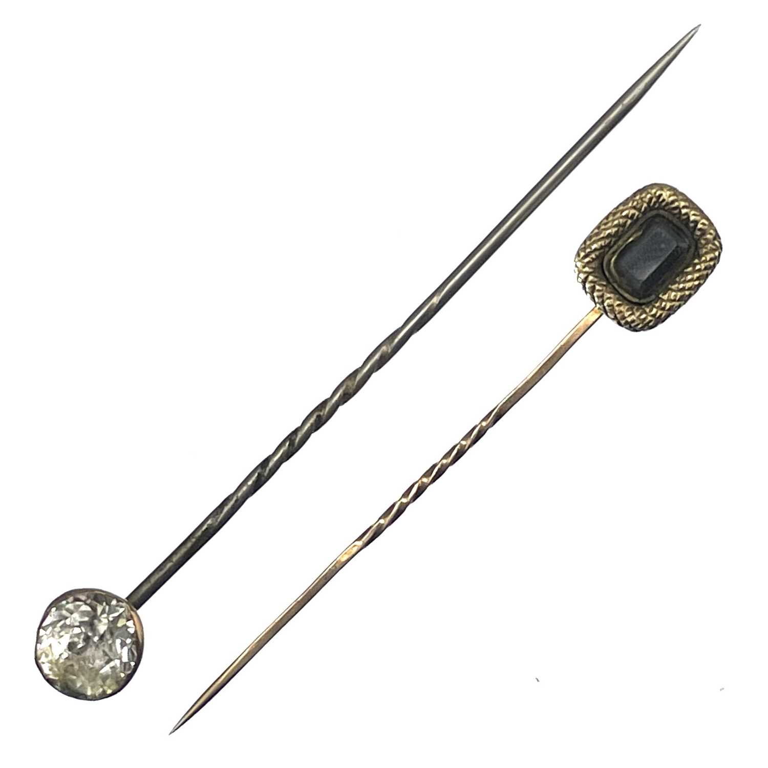 Lot 249 - Two 19th century stick pins.