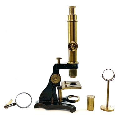 Lot 57 - A brass and painted metal microscope, circa...