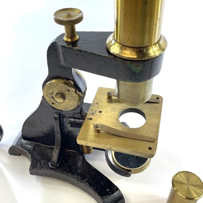 Lot 57 - A brass and painted metal microscope, circa...
