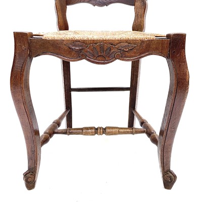 Lot 67 - A set of nine French oak dining chairs, circa 1900.