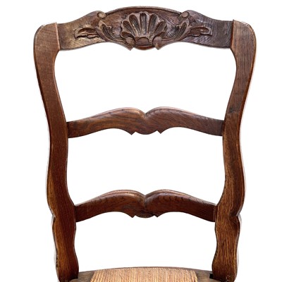 Lot 67 - A set of nine French oak dining chairs, circa 1900.