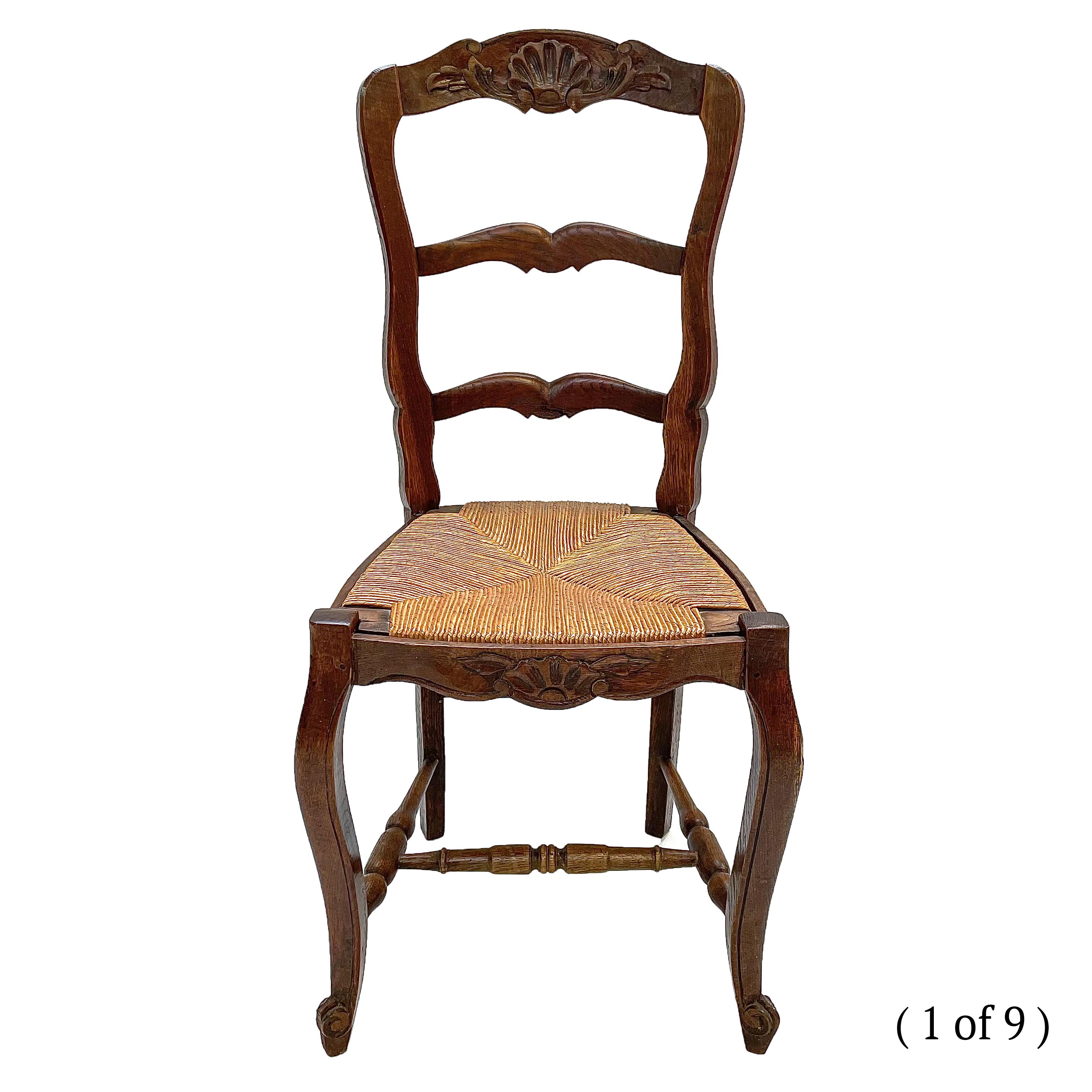 Lot 67 A set of nine French oak dining chairs, circa