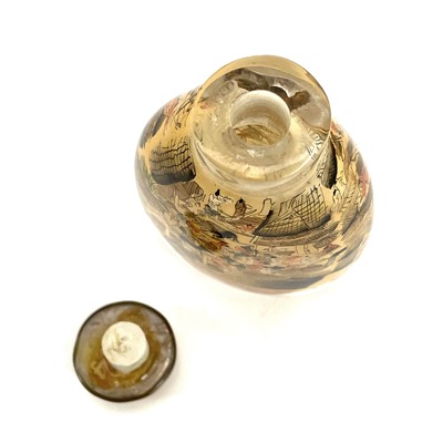 Lot 207 - A Chinese inside painted snuff bottle with hardstone stopper.