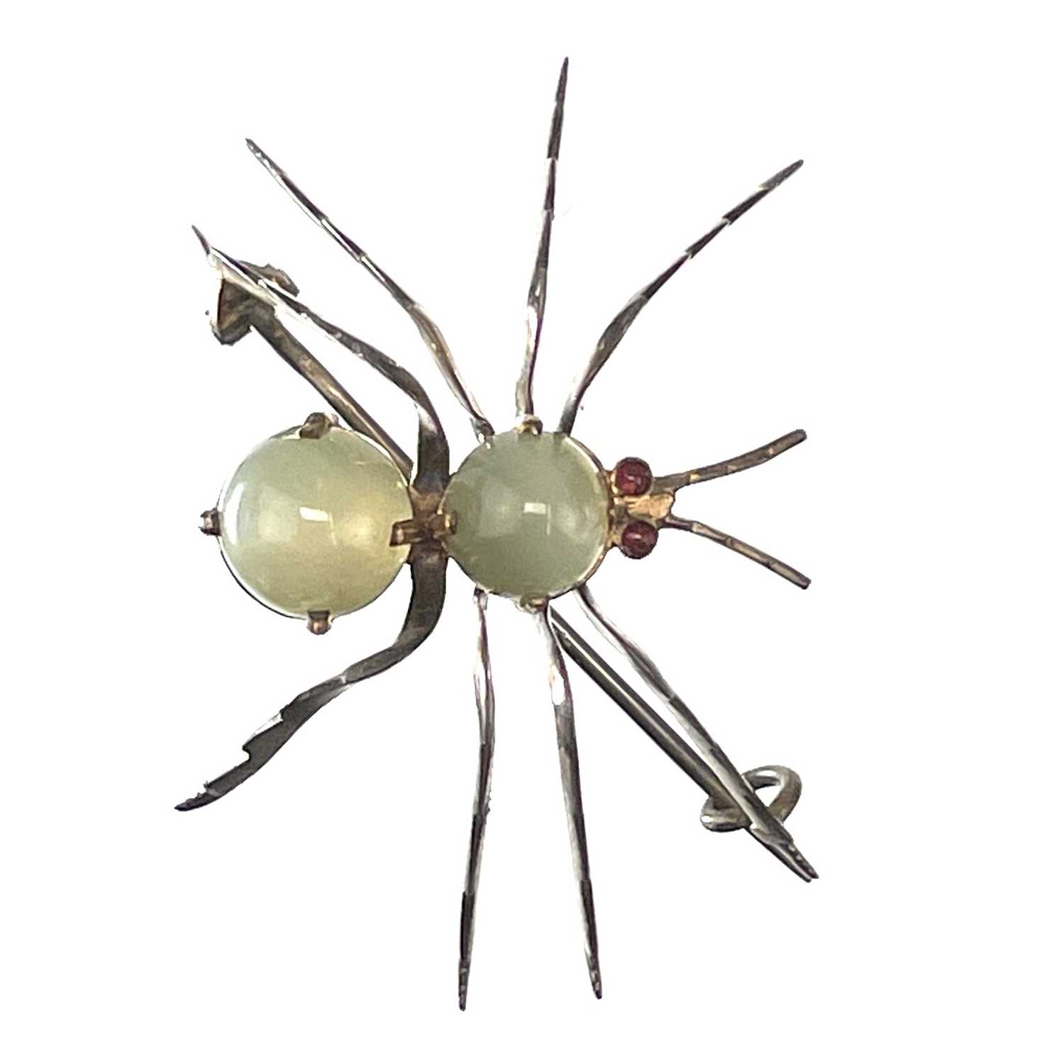 Lot 59 - A Victorian silver gem set spider brooch.