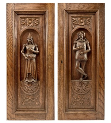 Lot 71 - A pair of Flemish carved oak furniture panels, circa 1900.