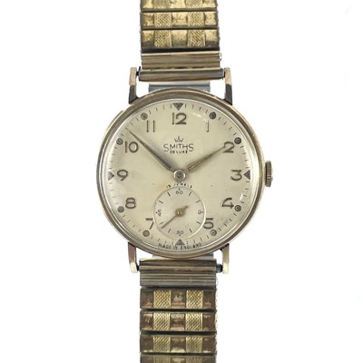 Lot 329 - A Smiths Deluxe 9ct gold 1940's gentleman's wristwatch.